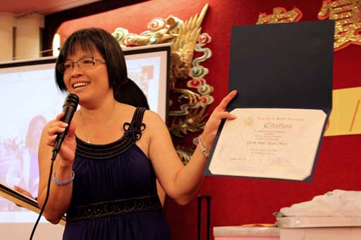 Shirley reading NY State Assemblewoman Nicole Malliotakis's Citation for Gene and Kee